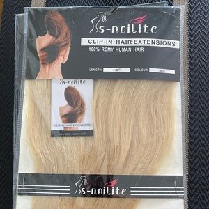 Clip in 100% Remy
Human Hair
Extensions #60, 20”
Platinum Blonde... BRAND NEW.